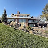2025-04-17 Back of house after of a full repaint of soffit and trim.